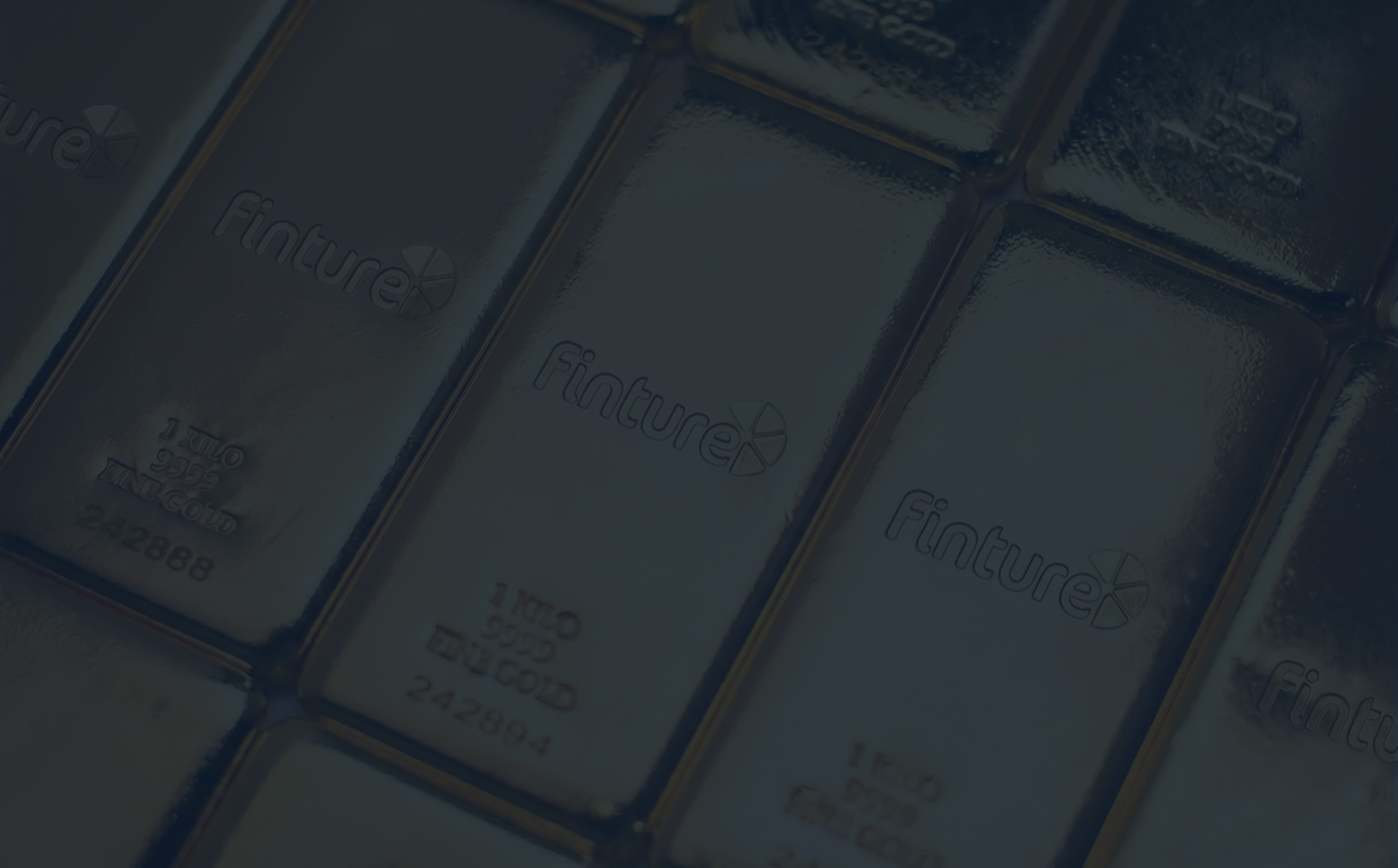 Physische Goldbarren auf dunklem Hintergrund